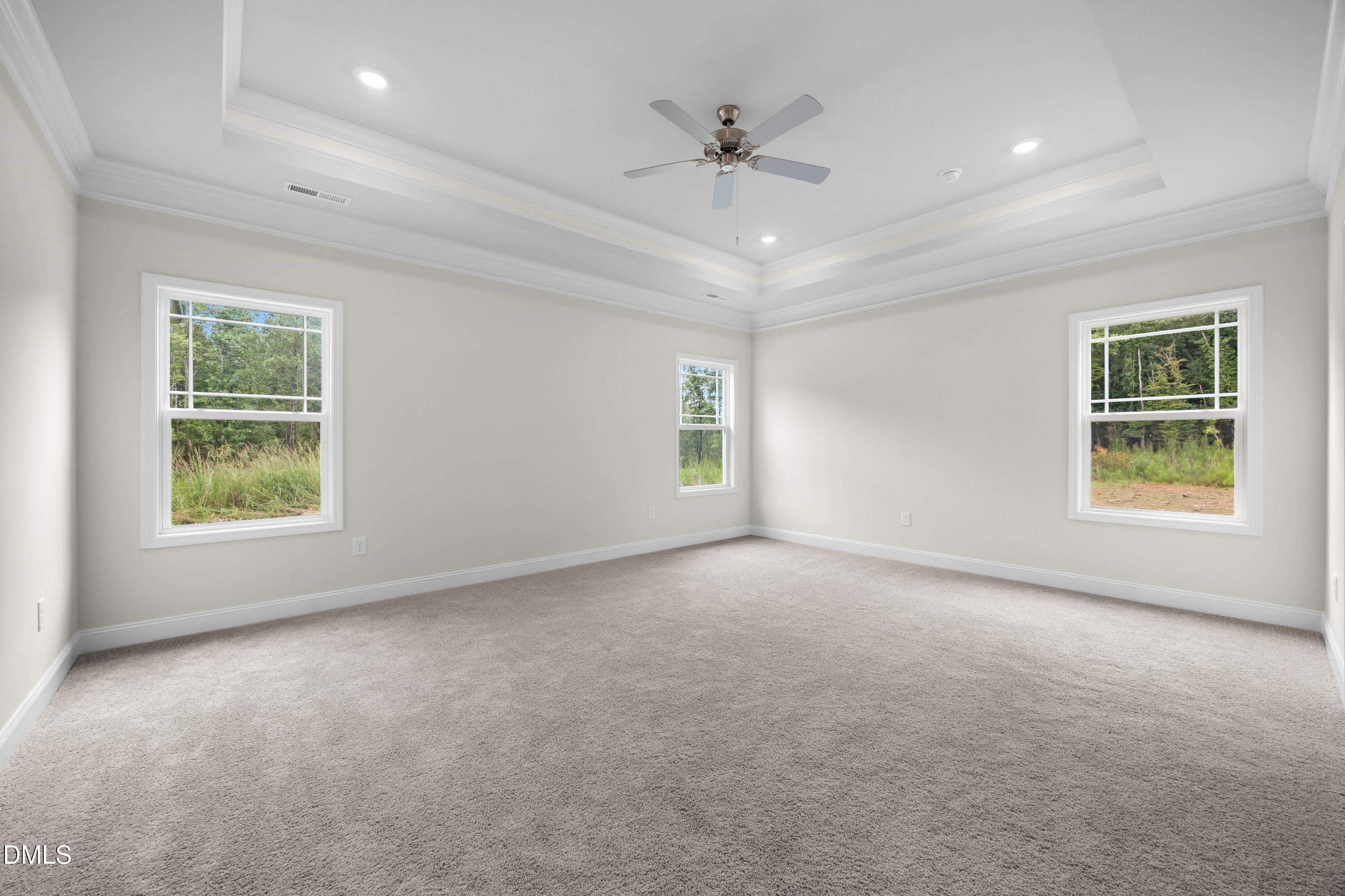 227 Galway Road Lillington, NC 27546 - Photo 18 of 36 an empty room with windows and closet