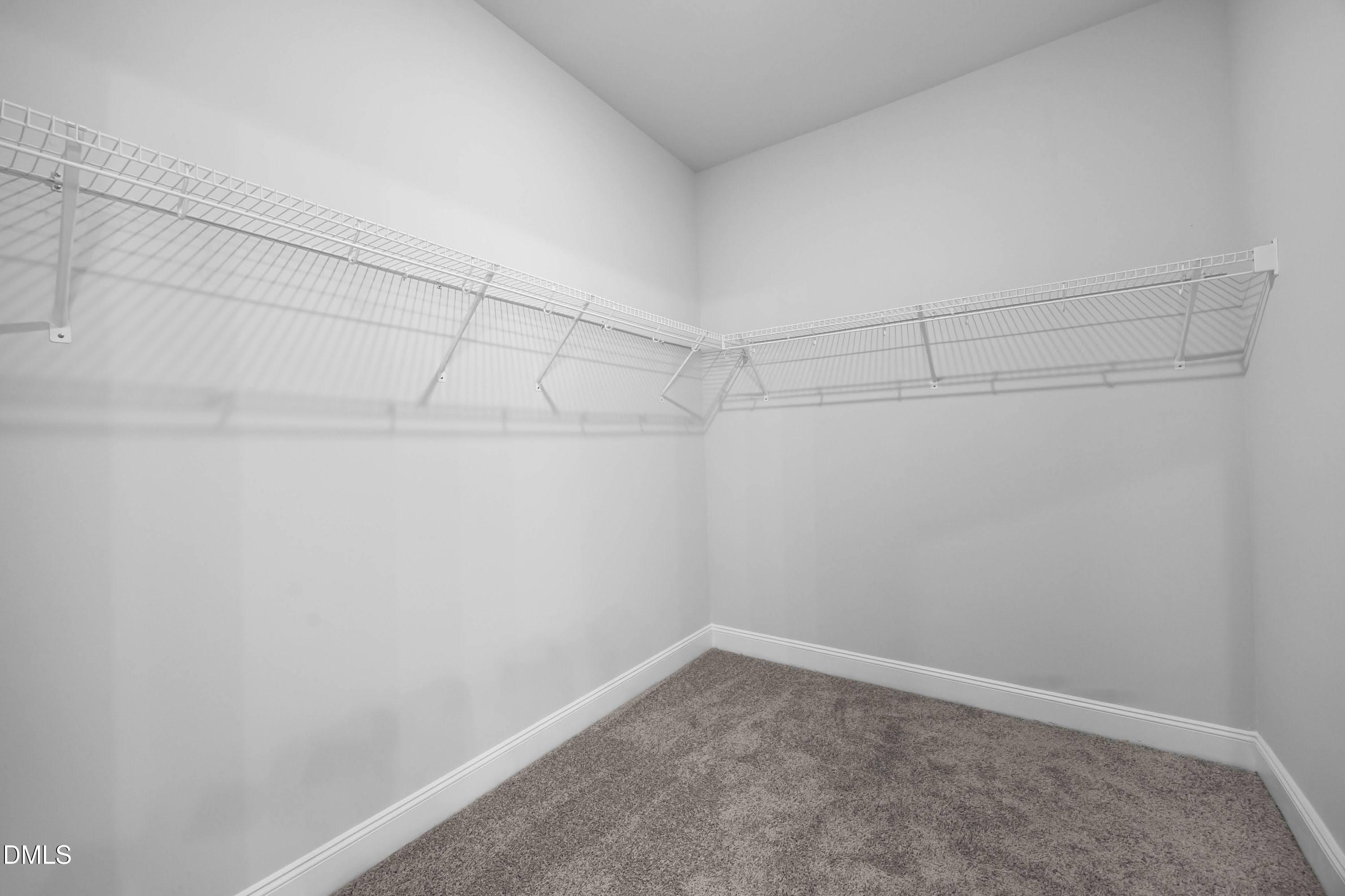 227 Galway Road Lillington, NC 27546 - Photo 24 of 36 a view of a room with racks on the wall