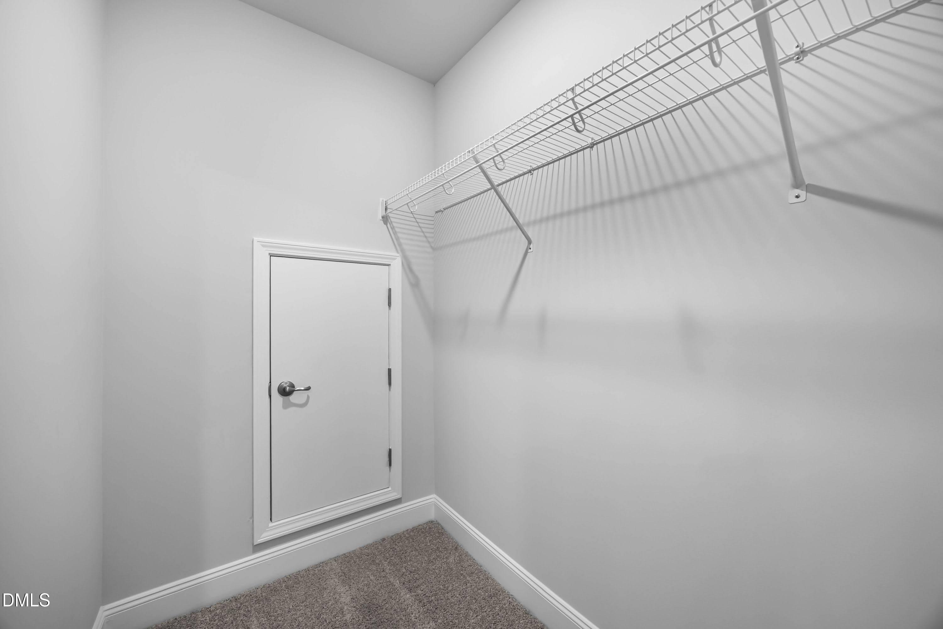 227 Galway Road Lillington, NC 27546 - Photo 34 of 36 a view of a room with racks on the wall