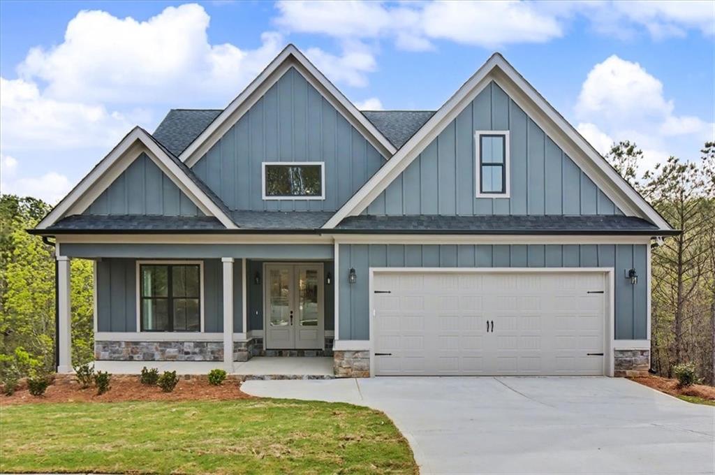 16 Altar Rock Court Cartersville, GA 30121 - Photo 1 of 52 a front view of a house with a yard and garage