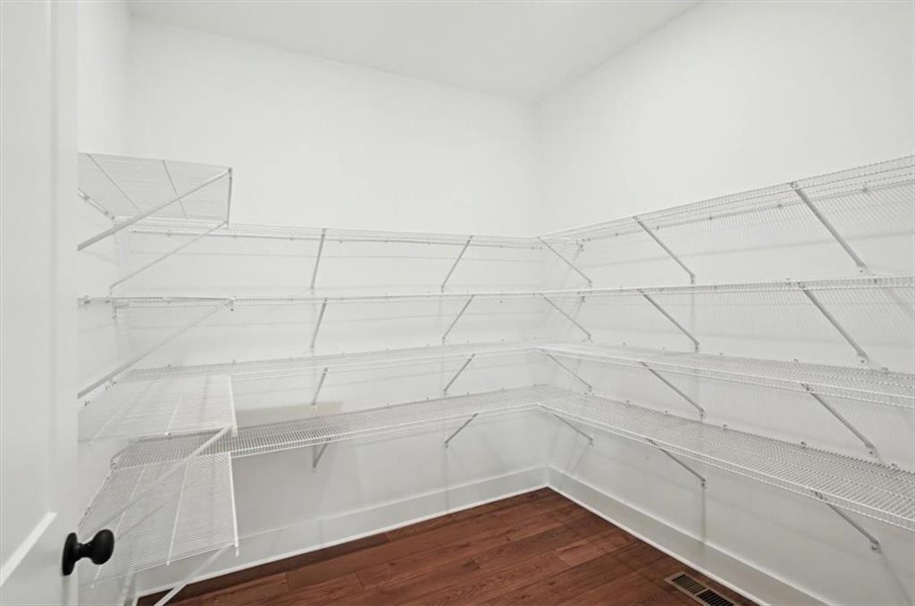 16 Altar Rock Court Cartersville, GA 30121 - Photo 15 of 52 a view of a room with racks on the wall