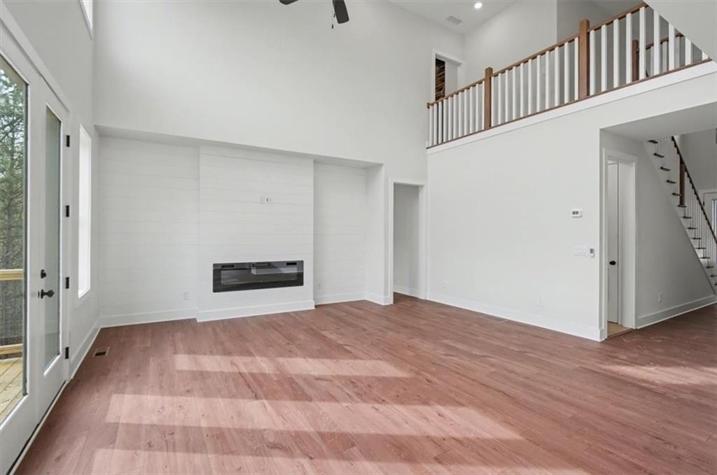 16 Altar Rock Court Cartersville, GA 30121 - Photo 18 of 52 a view of empty room with wooden floor