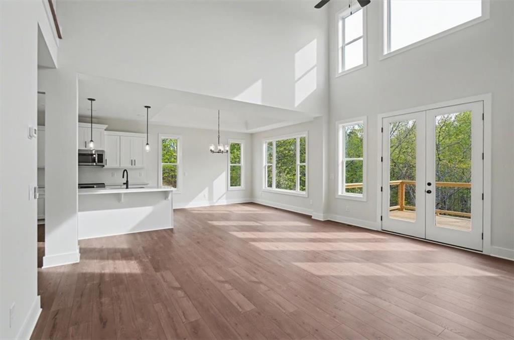16 Altar Rock Court Cartersville, GA 30121 - Photo 21 of 52 a view of an empty room with large windows