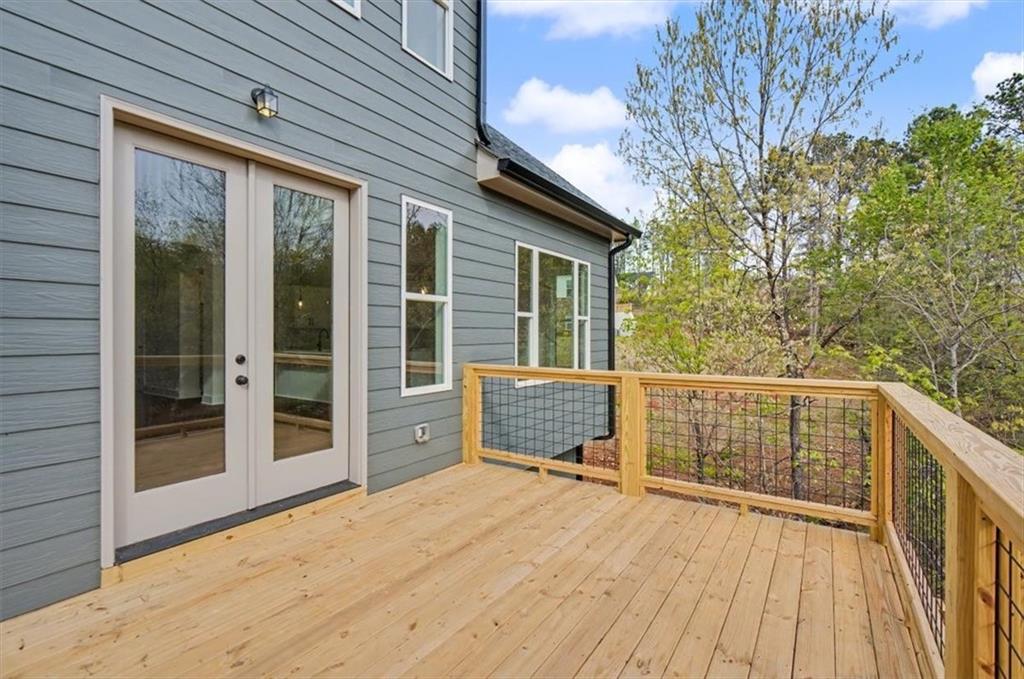 16 Altar Rock Court Cartersville, GA 30121 - Photo 24 of 52 a view of a deck with wooden floor and fence