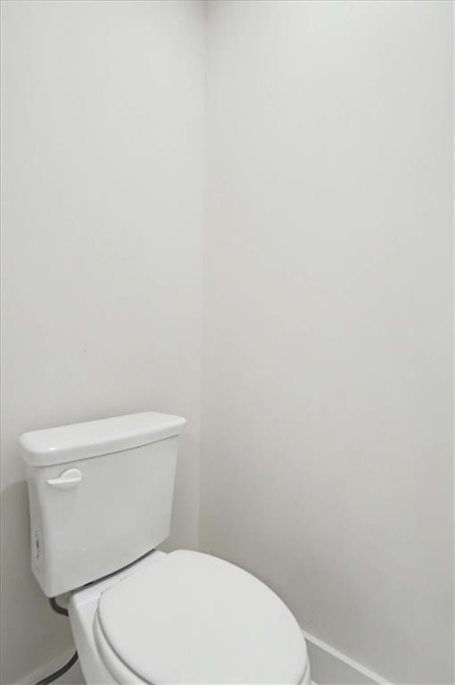 16 Altar Rock Court Cartersville, GA 30121 - Photo 35 of 52 a white toilet sitting next to a white wall