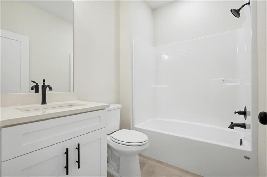 16 Altar Rock Court Cartersville, GA 30121 - Photo 41 of 52 a bathroom with a sink a toilet and shower