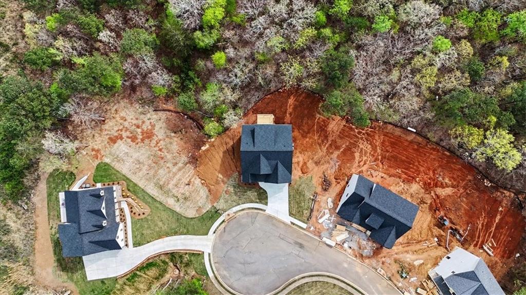 16 Altar Rock Court Cartersville, GA 30121 - Photo 49 of 52 an aerial view of a house with backyard space and seating area