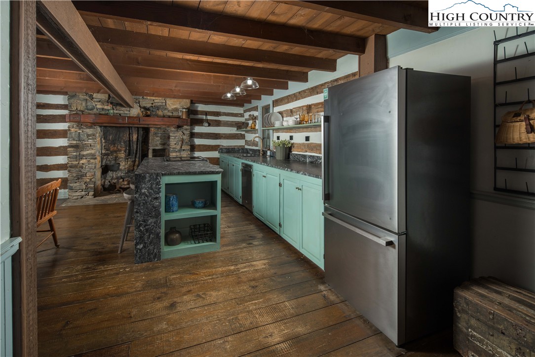 1534 Highway 194 Boone, NC 28607 - Photo 12 of 50 a kitchen with refrigerator and window