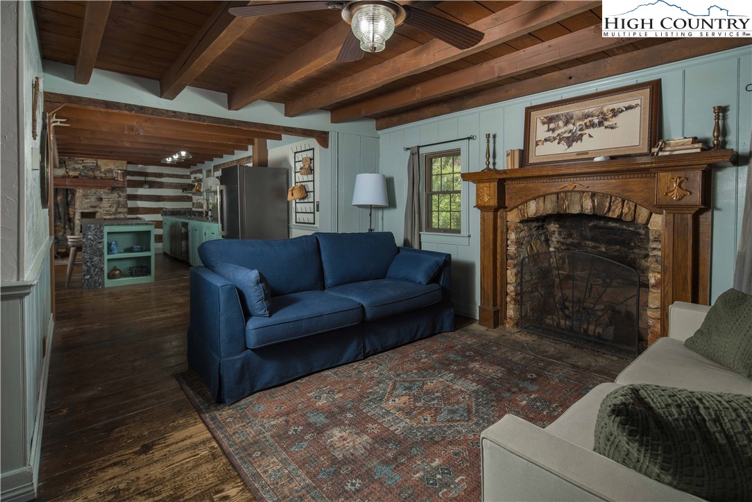 1534 Highway 194 Boone, NC 28607 - Photo 15 of 50 a living room with furniture and a fireplace