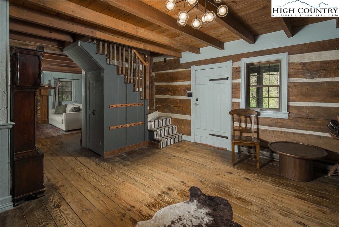 1534 Highway 194 Boone, NC 28607 - Photo 18 of 50 a room with wooden door and furniture