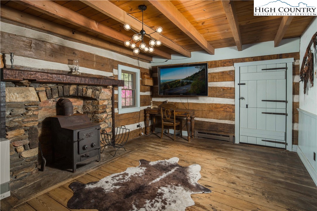 1534 Highway 194 Boone, NC 28607 - Photo 19 of 50 a view of a livingroom with furniture and a flat screen tv