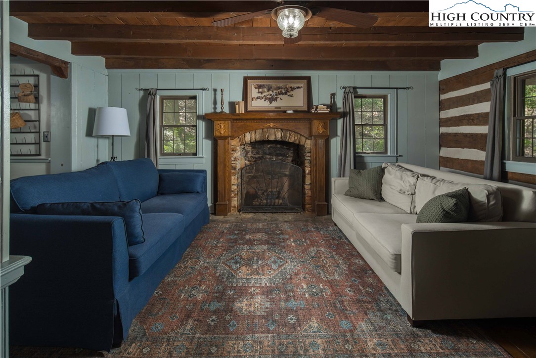 1534 Highway 194 Boone, NC 28607 - Photo 20 of 50 a living room with furniture and a fireplace