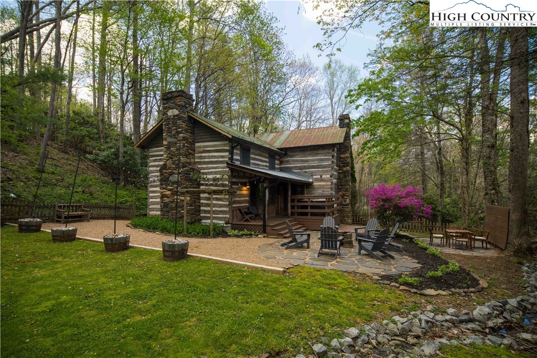1534 Highway 194 Boone, NC 28607 - Photo 2 of 50 a view of a house with backyard
