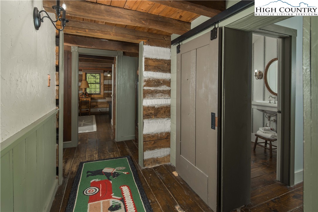 1534 Highway 194 Boone, NC 28607 - Photo 21 of 50 a view of hallway with wooden floor