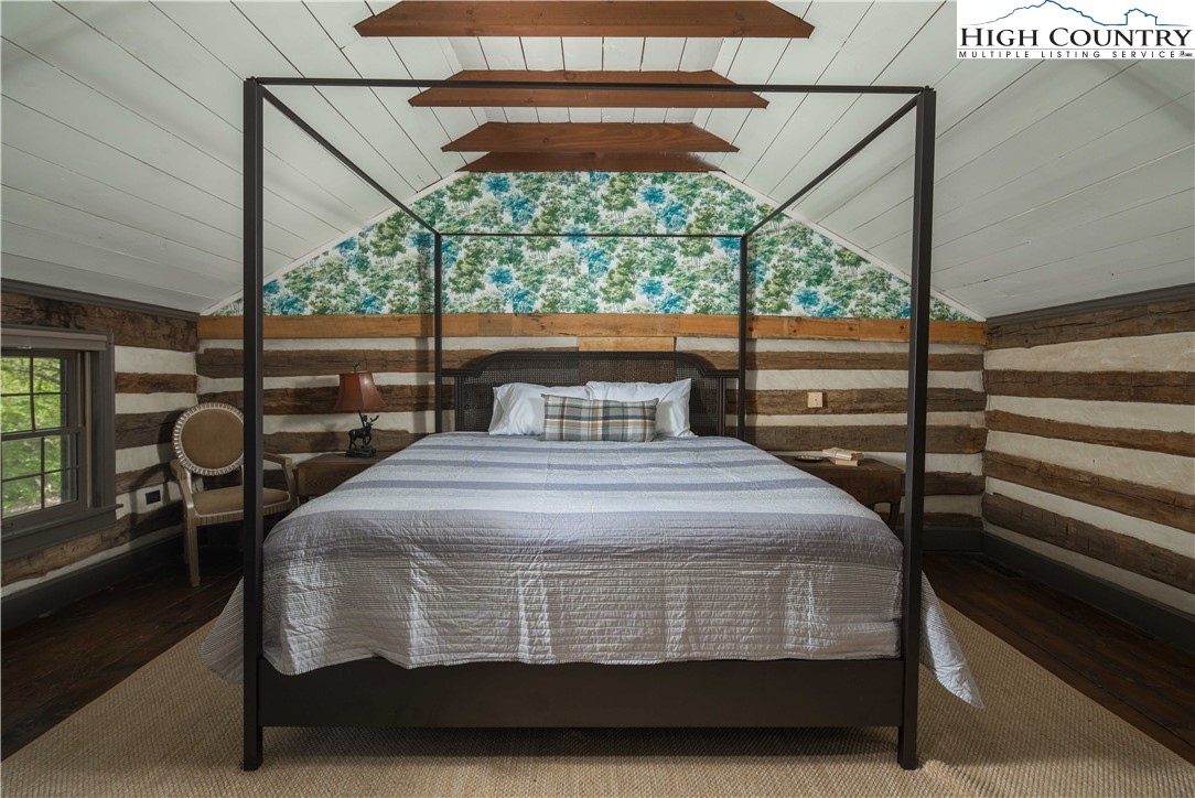 1534 Highway 194 Boone, NC 28607 - Photo 29 of 50 a bedroom with a bed and window