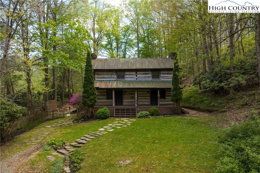 1534 Highway 194 Boone, NC 28607 - Photo 3 of 50 a front view of a house with garden