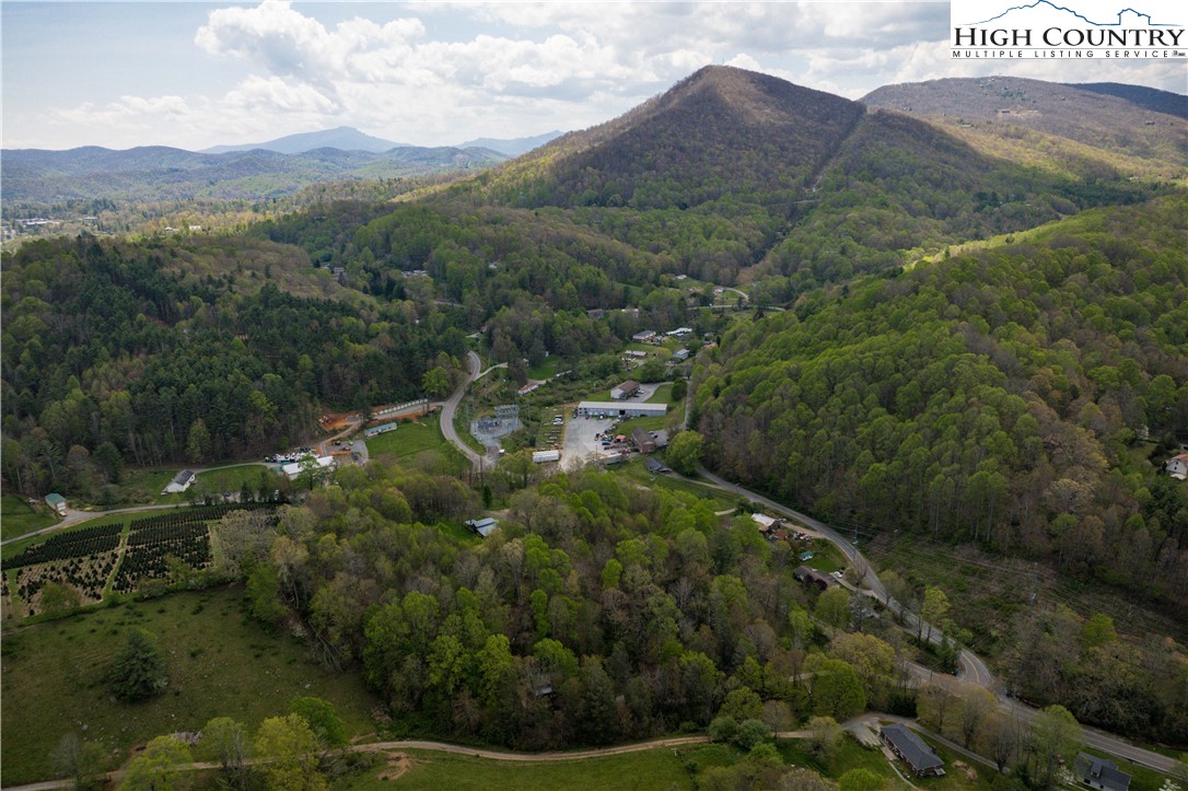 1534 Highway 194 Boone, NC 28607 - Photo 35 of 50 an aerial view of residential houses with outdoor space and trees