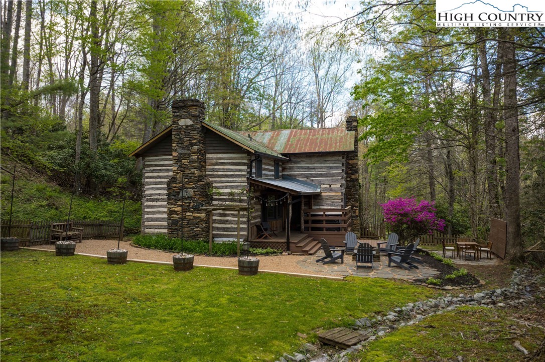 1534 Highway 194 Boone, NC 28607 - Photo 36 of 50 a view of a house with backyard and sitting area