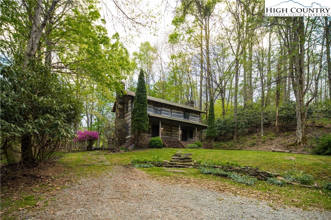 1534 Highway 194 Boone, NC 28607 - Photo 39 of 50 a front view of house with yard and green space