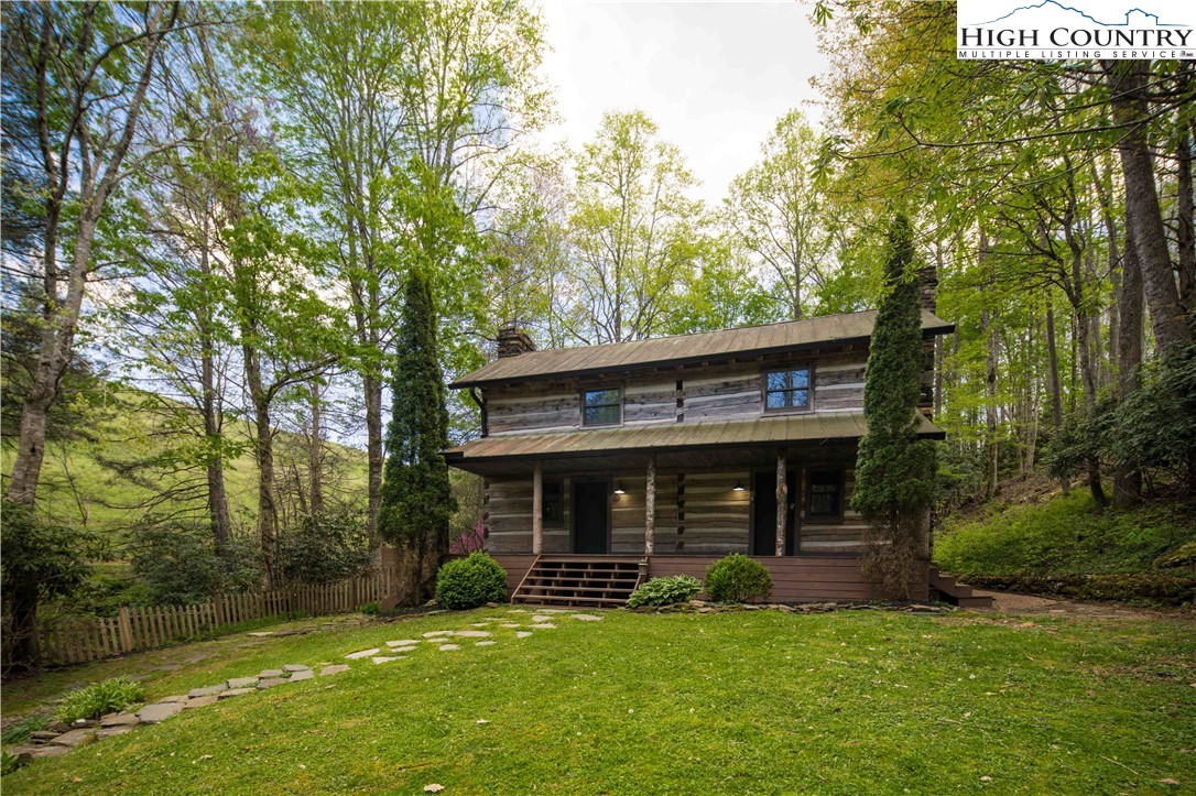 1534 Highway 194 Boone, NC 28607 - Photo 4 of 50 a view of a chair and table in backyard of the house
