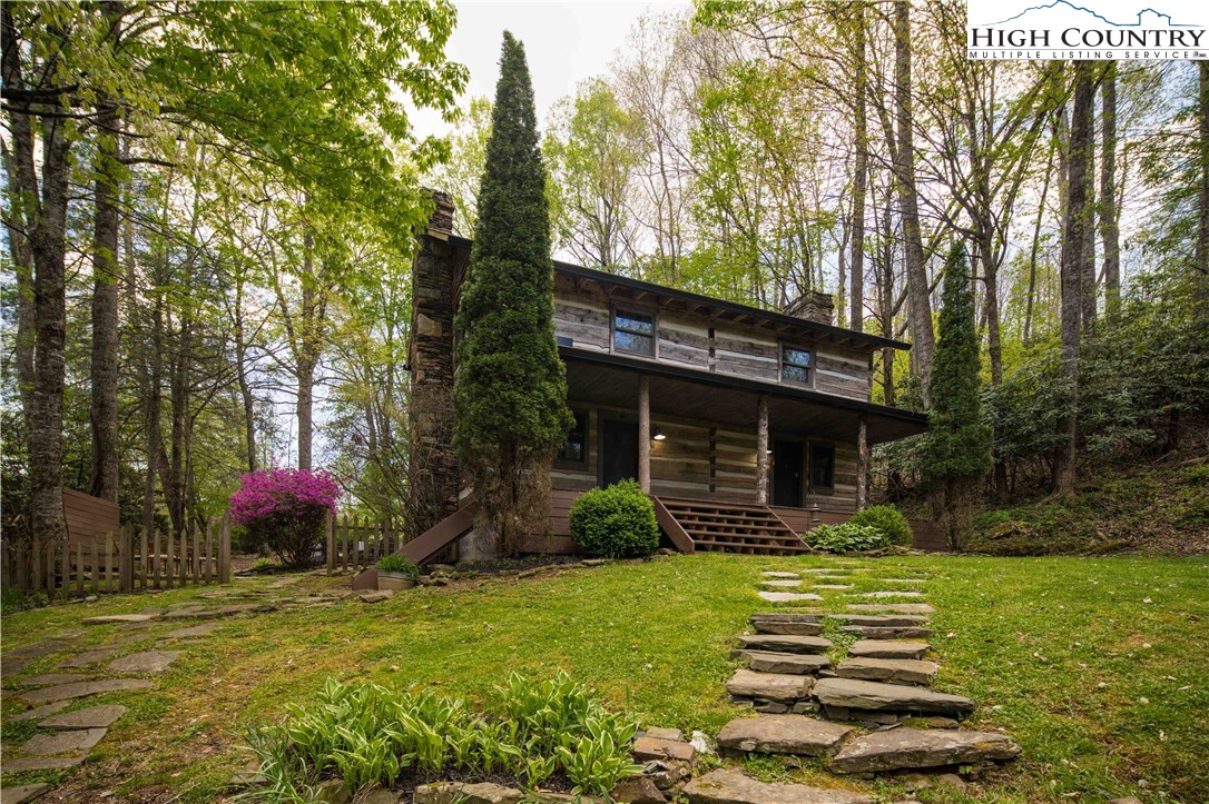 1534 Highway 194 Boone, NC 28607 - Photo 41 of 50 a front view of a house with garden