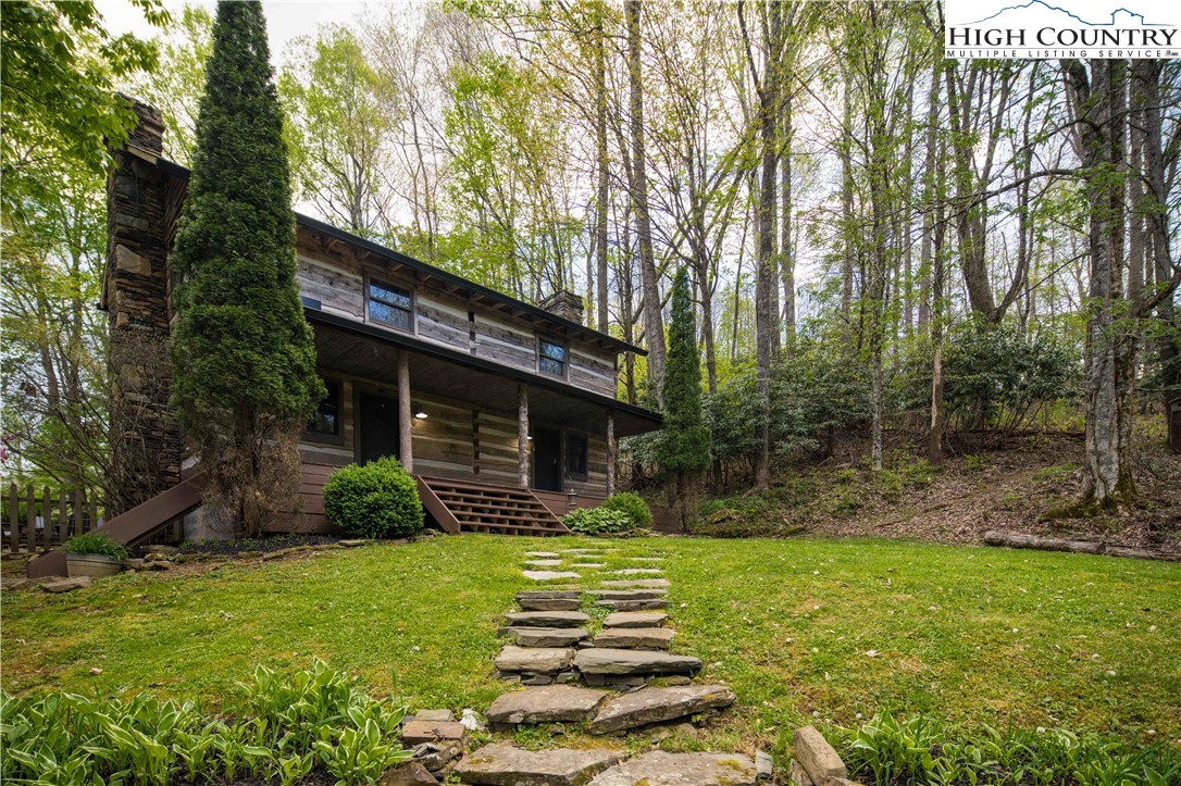 1534 Highway 194 Boone, NC 28607 - Photo 42 of 50 a front view of a house with garden