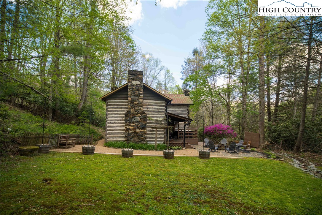 1534 Highway 194 Boone, NC 28607 - Photo 44 of 50 a front view of a house with garden