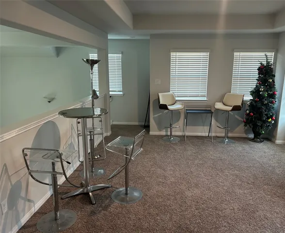 a bathroom with a tub and a sink