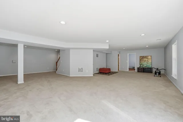 a view of a balcony with wooden floor