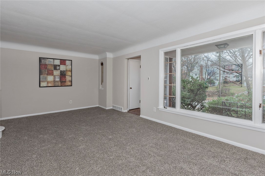 4402 Bayard Road South Euclid, OH 44121 - Photo 5 of 27 Spacious living room with new carpeting 2023