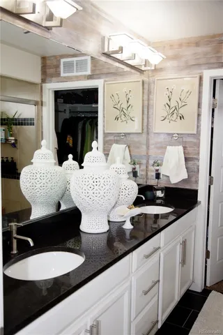 a living room with granite countertop furniture and a fireplace