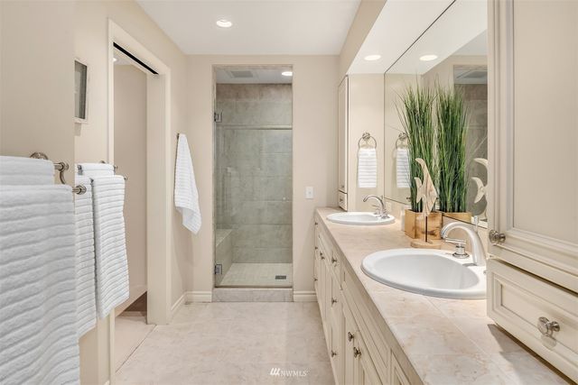 a bathroom with a shower and a toilet