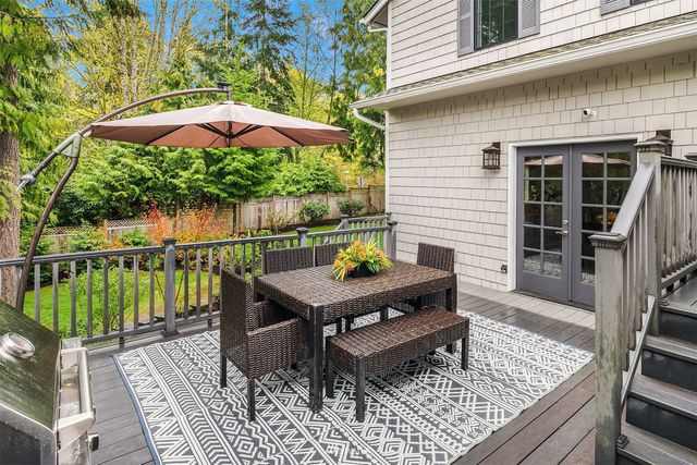 a view of a chairs on the deck