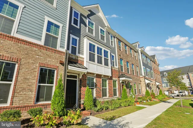 a front view of a multi story residential apartment building