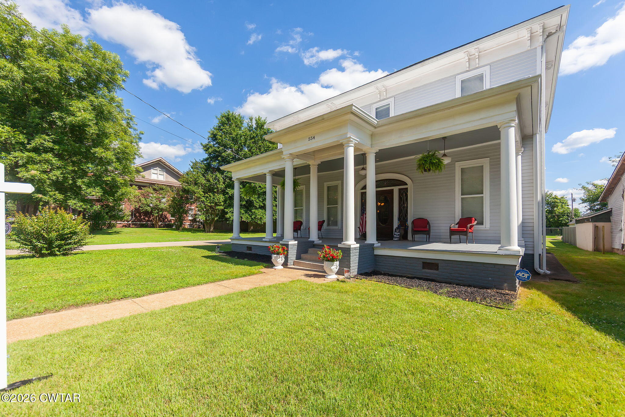 554 East Main Street Jackson, TN 38301 - Photo 44 of 60 a view of a house with a yard patio and swimming pool