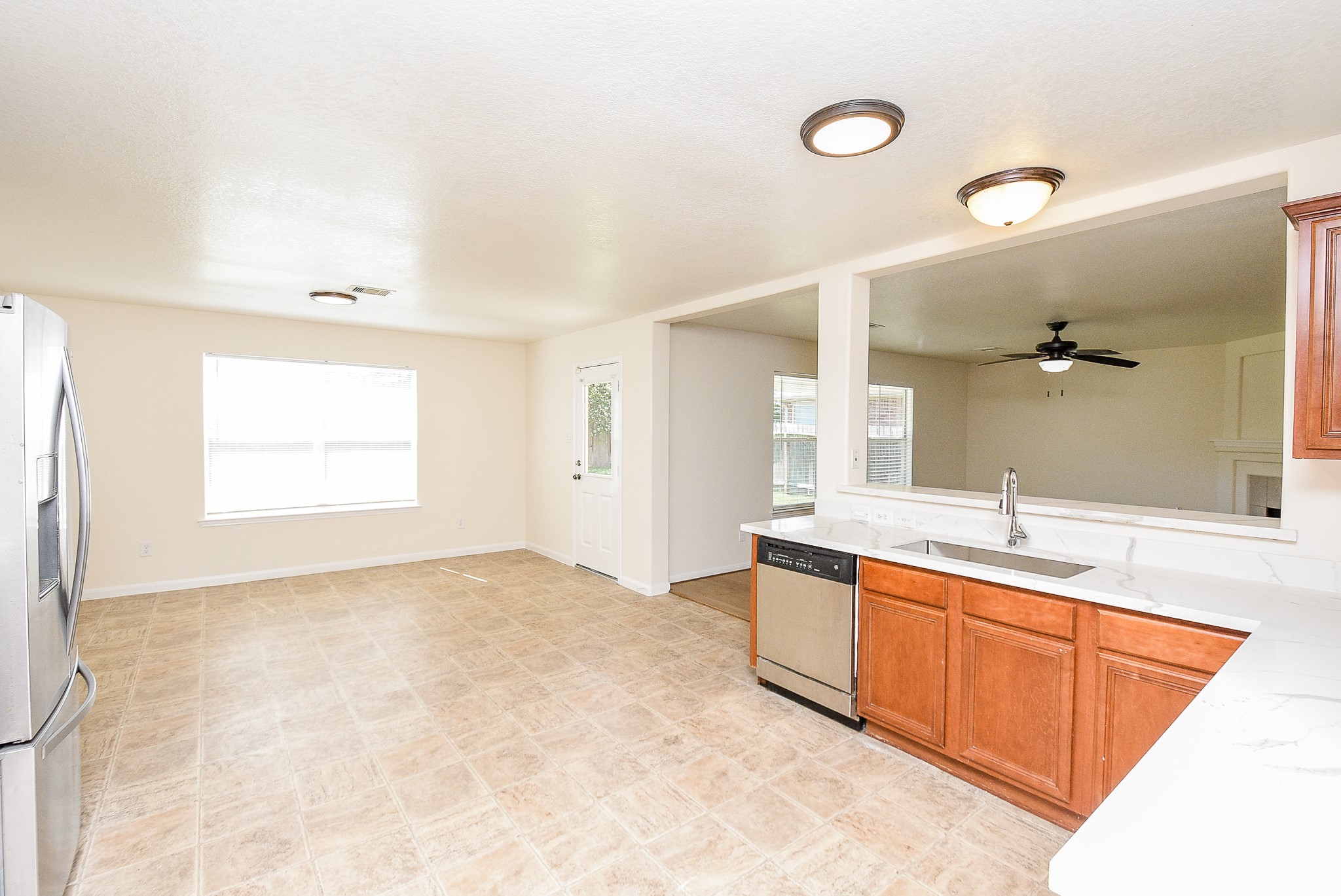 32406 Cross Spring Park Lane Conroe, TX 77385 - Photo 12 of 32 a bathroom with a granite countertop sink a mirror and a bathtub
