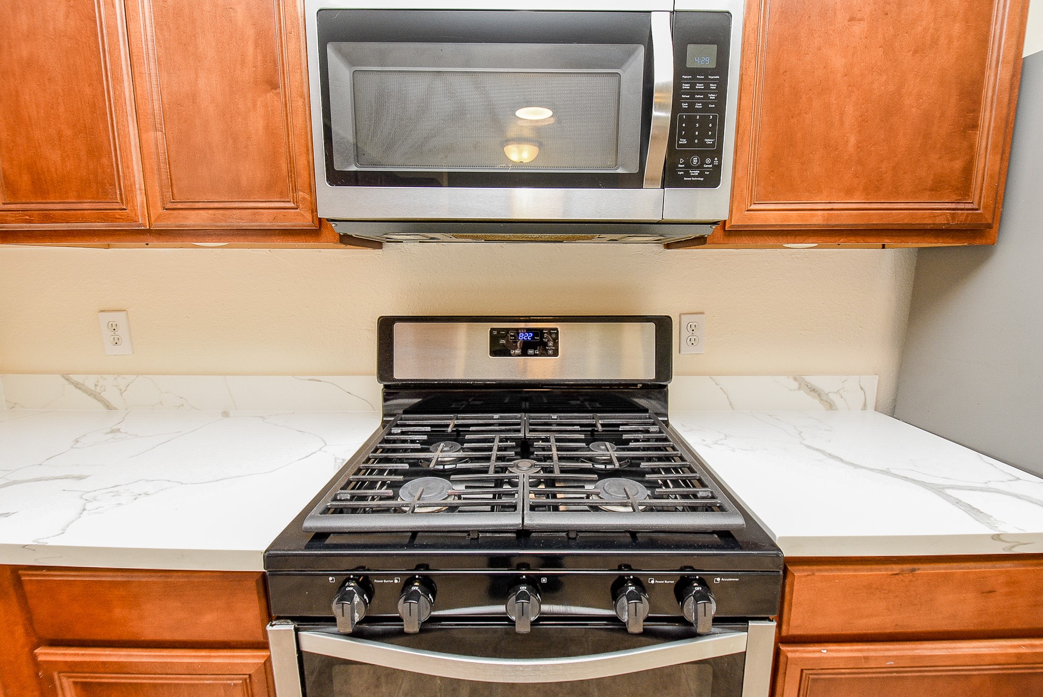 32406 Cross Spring Park Lane Conroe, TX 77385 - Photo 15 of 32 a stove top oven sitting inside of a kitchen