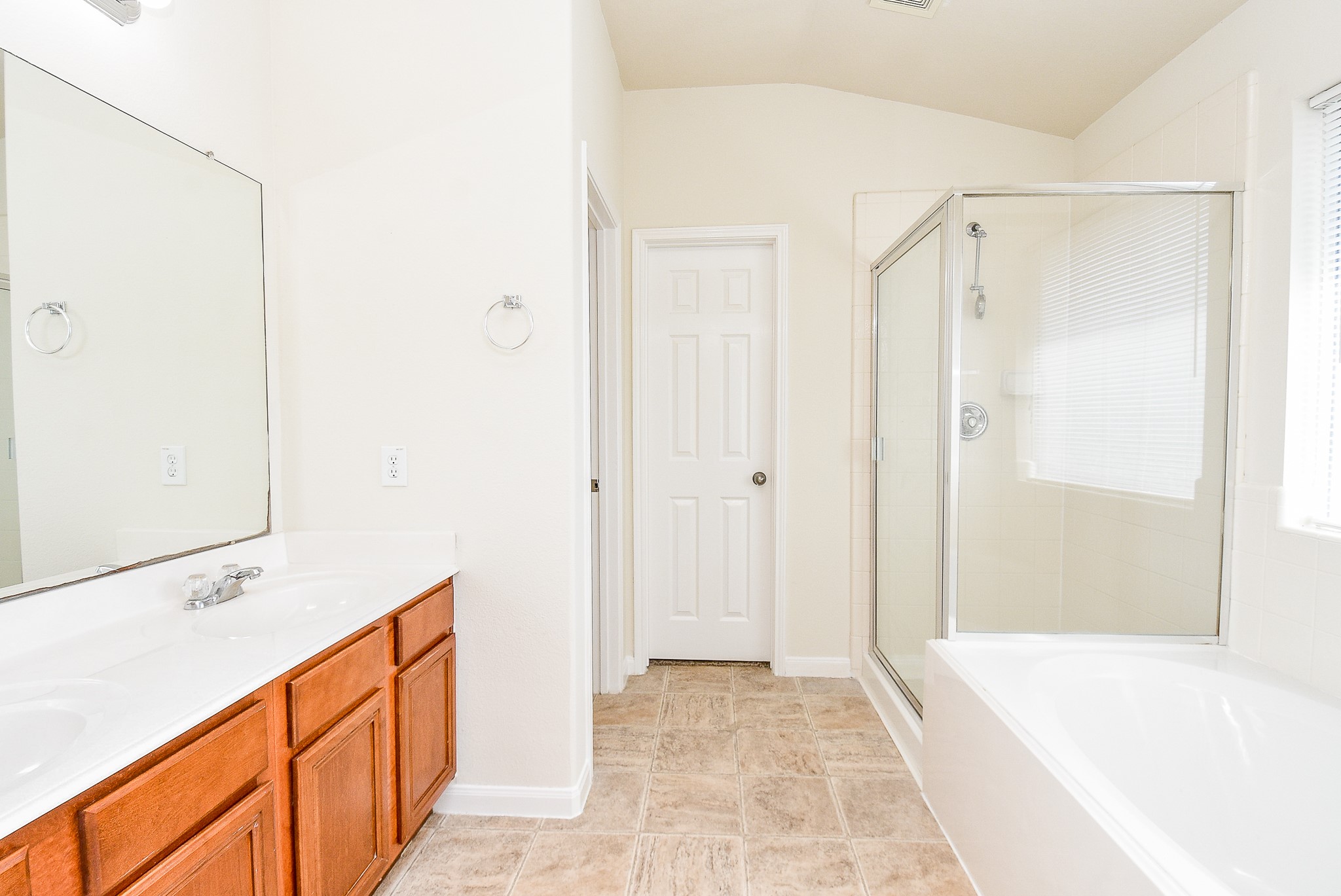 32406 Cross Spring Park Lane Conroe, TX 77385 - Photo 23 of 32 a bathroom with a tub shower and sink