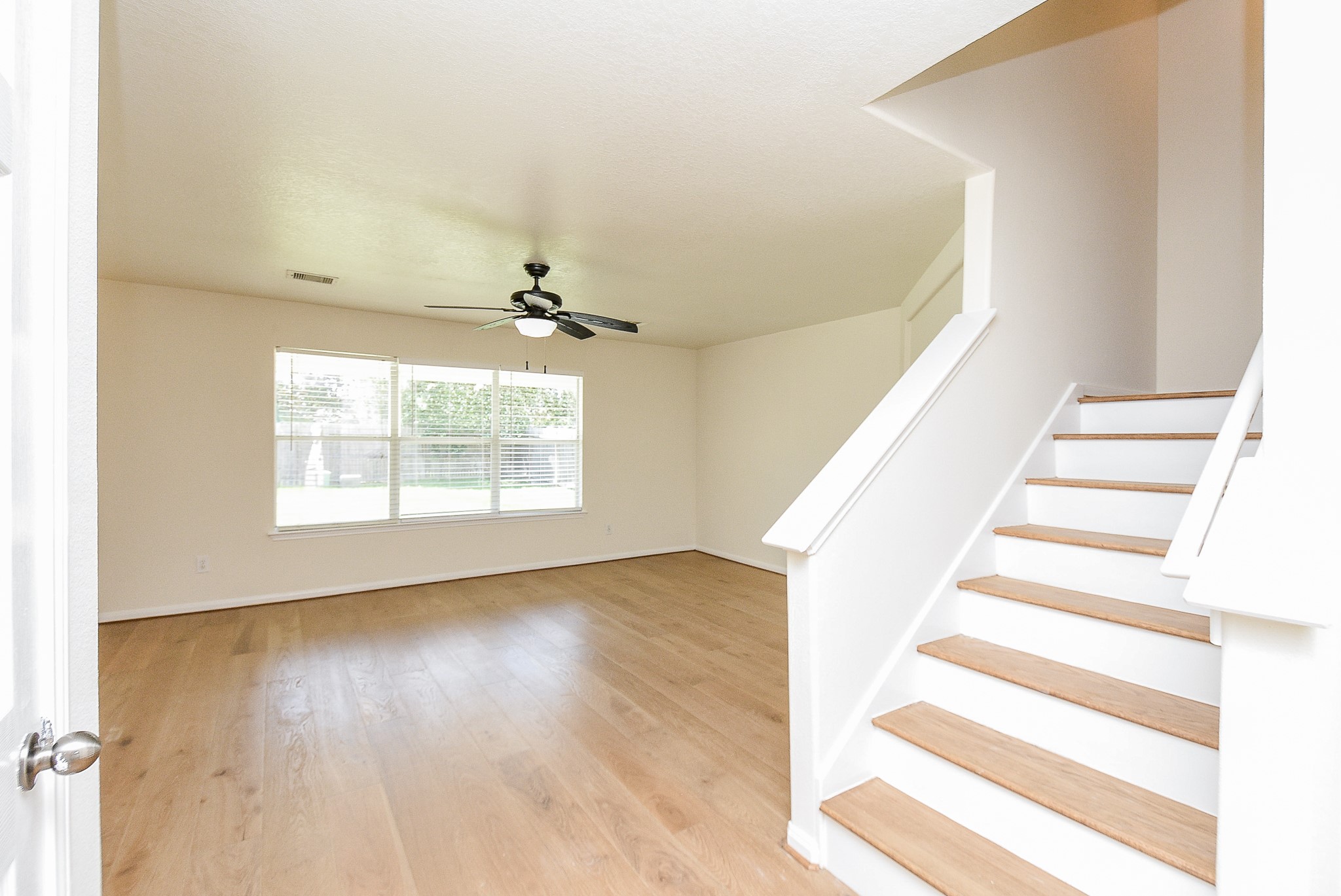 32406 Cross Spring Park Lane Conroe, TX 77385 - Photo 6 of 32 a view of an entryway with wooden floor