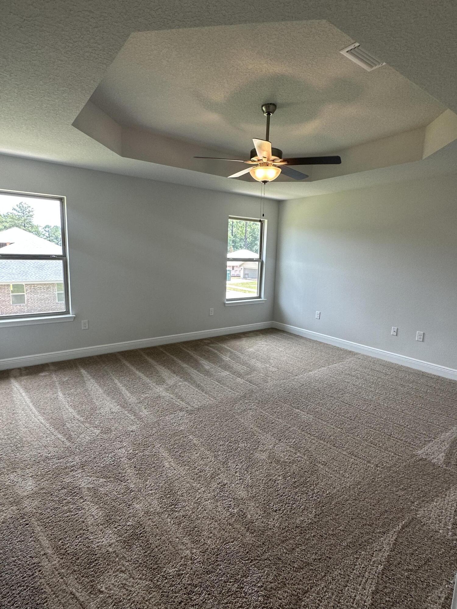 188 Ridgeway Circle Crestview, FL 32536 - Photo 13 of 22 a view of an empty room with a window