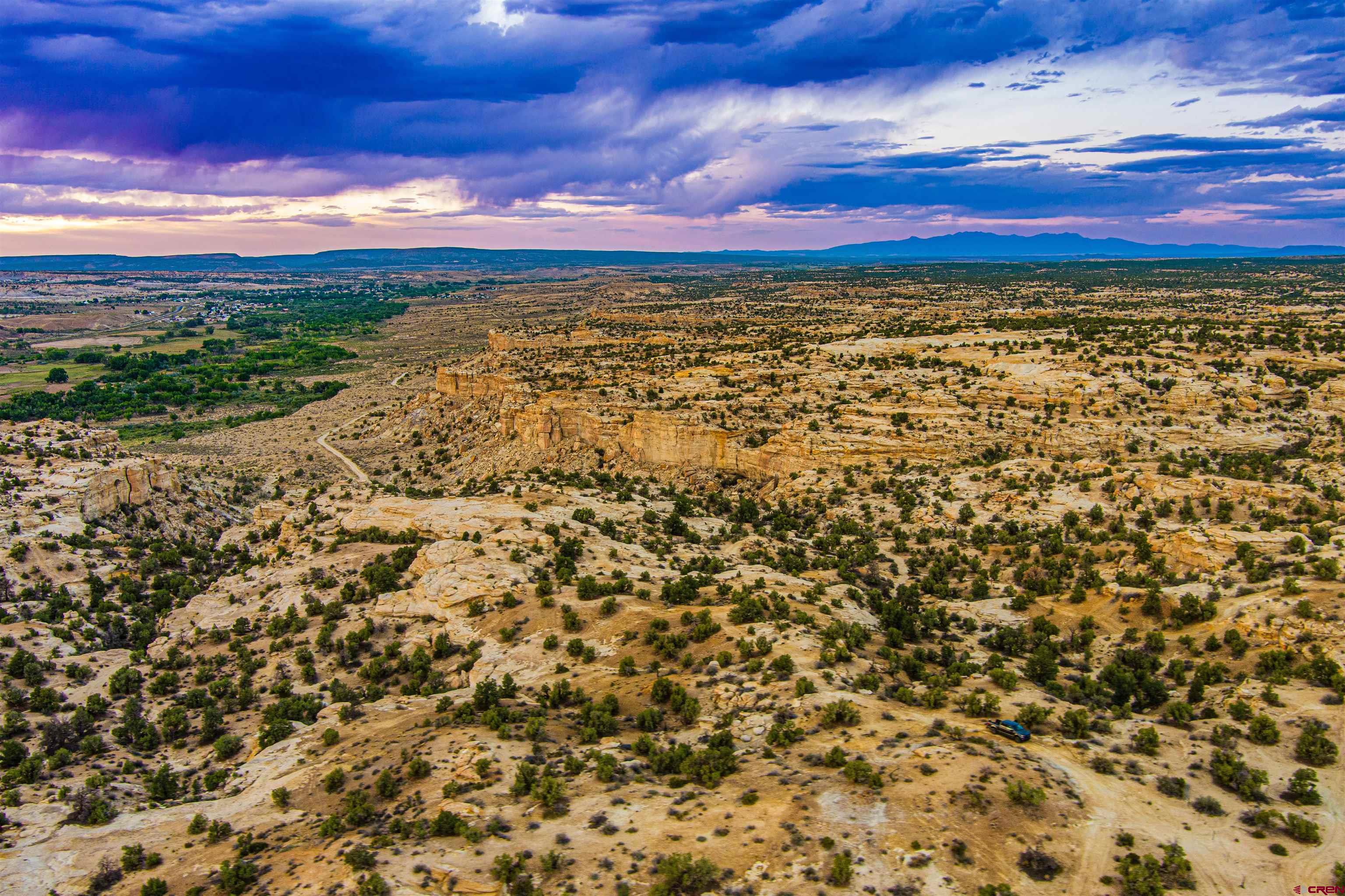 Nya Glade Road Farmington, NM 87401 - Photo 13 of 45 a view of a yard with an ocean