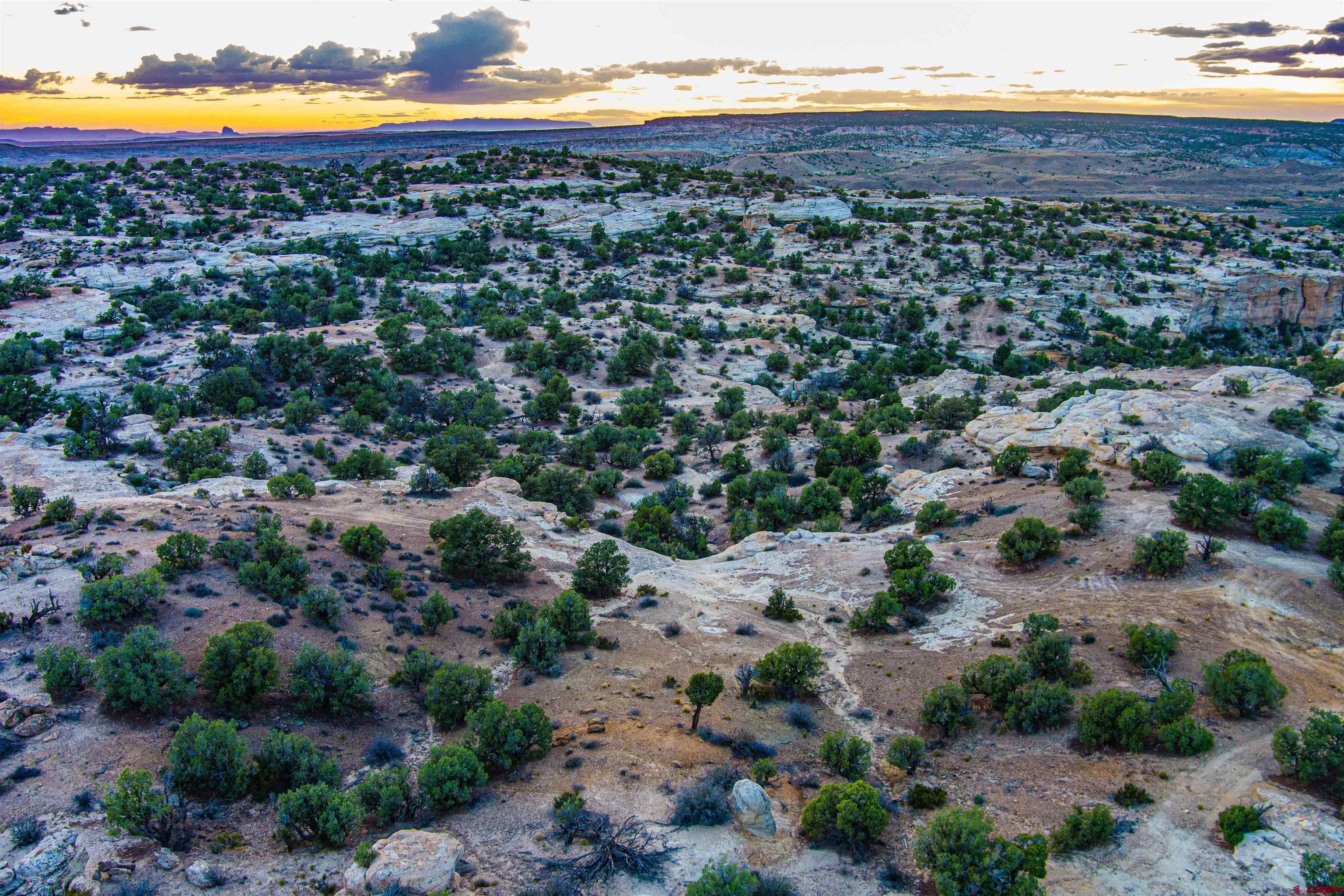 Nya Glade Road Farmington, NM 87401 - Photo 2 of 45 an aerial view of residential houses with outdoor space
