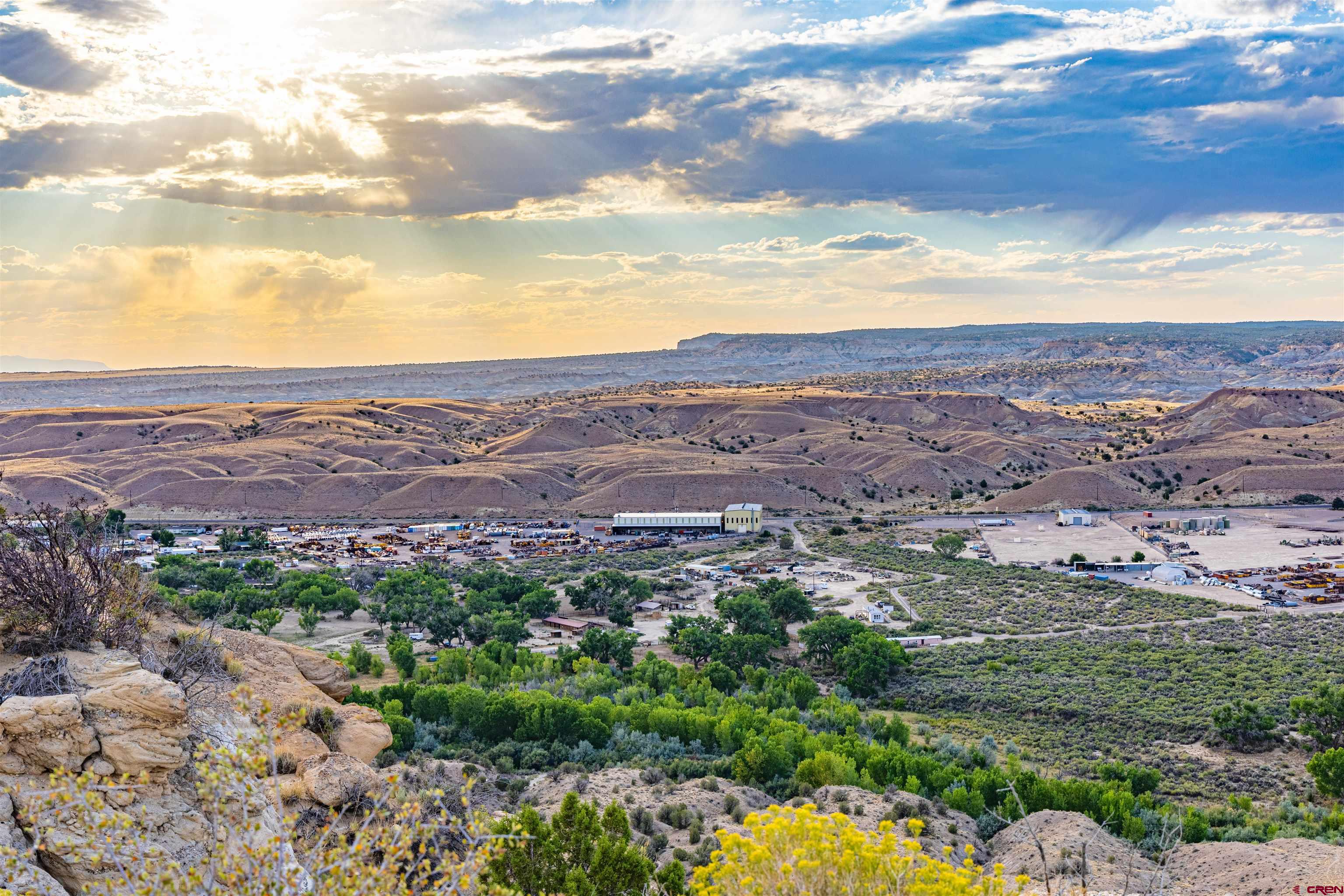 Nya Glade Road Farmington, NM 87401 - Photo 42 of 45 an aerial view of residential houses with outdoor space and mountain view