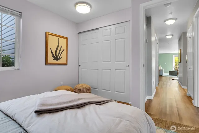 a bedroom with a bed and a view of bathroom