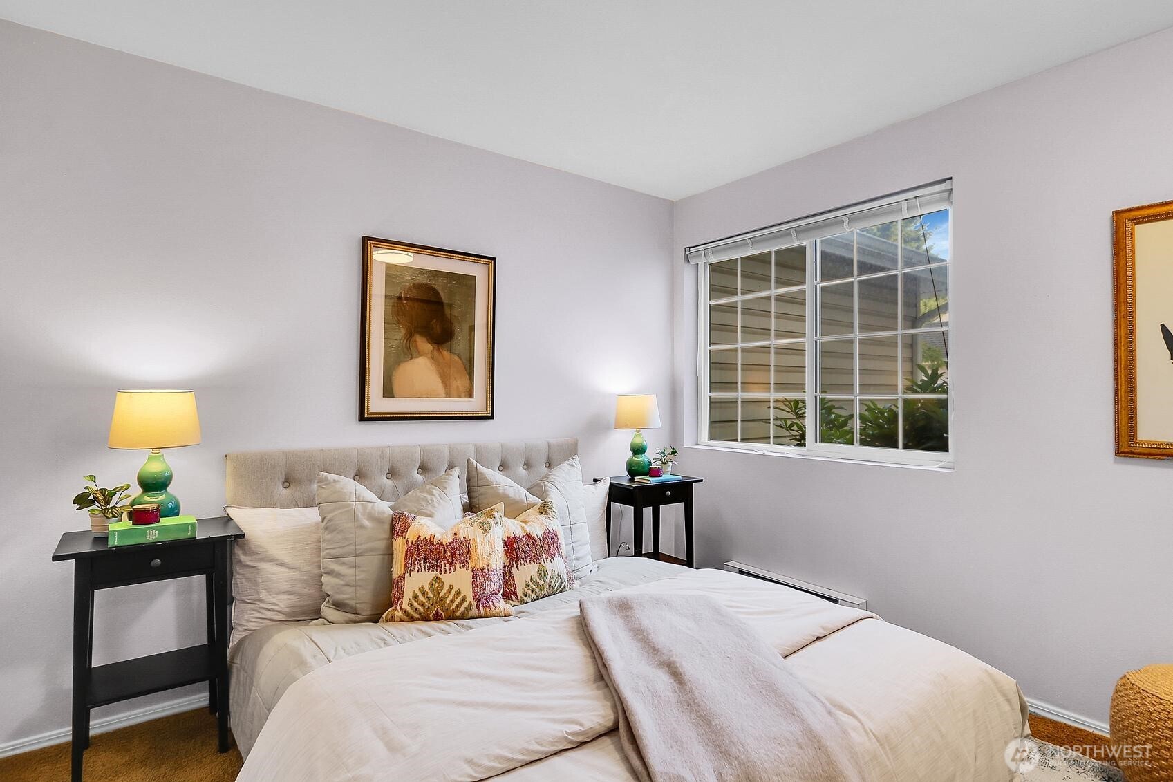 12505 4th Avenue West, Unit 1040 Everett, WA 98204 - Photo 9 of 20 a bedroom with a bed and a window