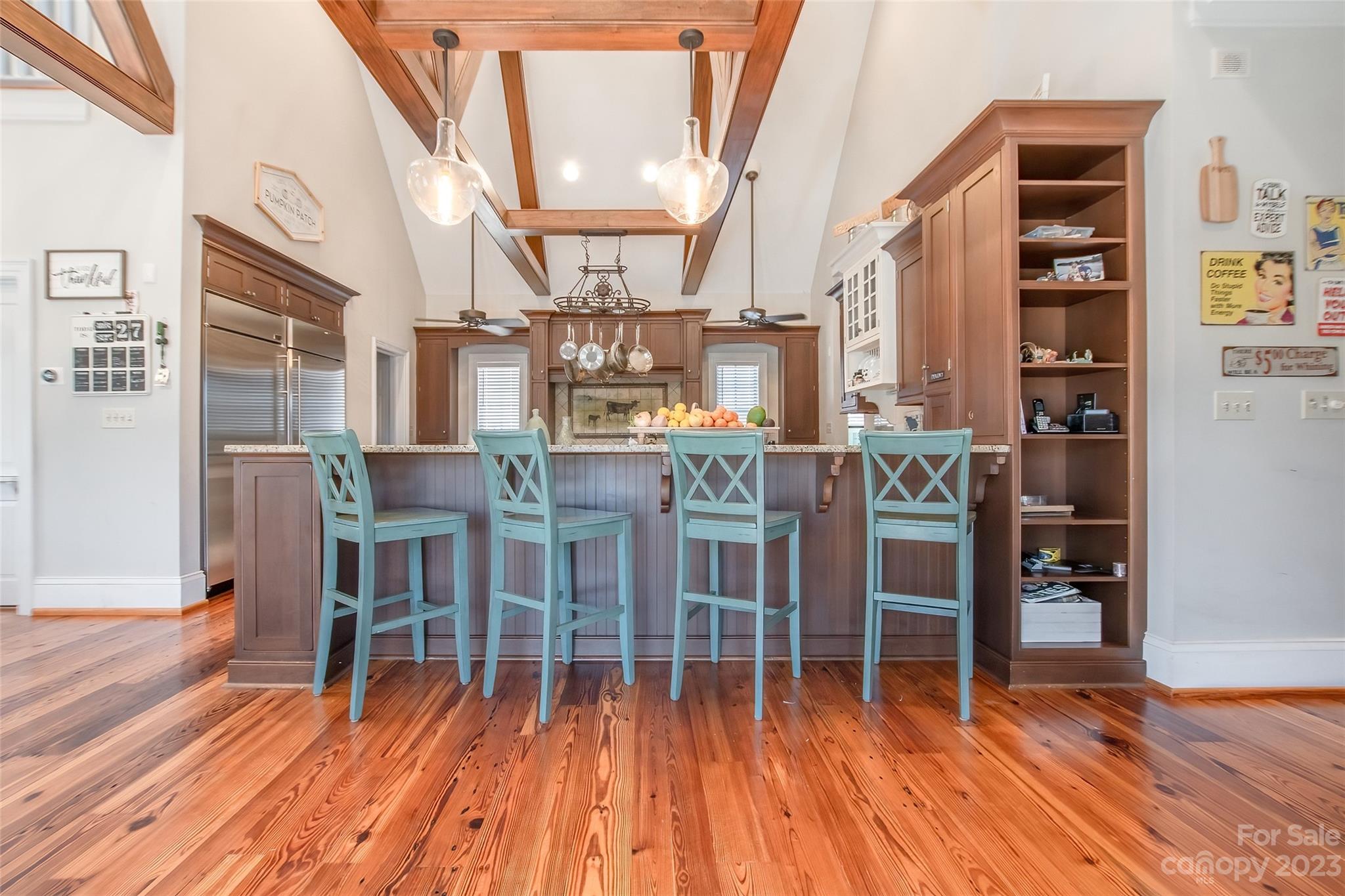 726 Frontier Road Clover, SC 29710 - Photo 8 of 46 a dining room with furniture a chandelier and wooden floor