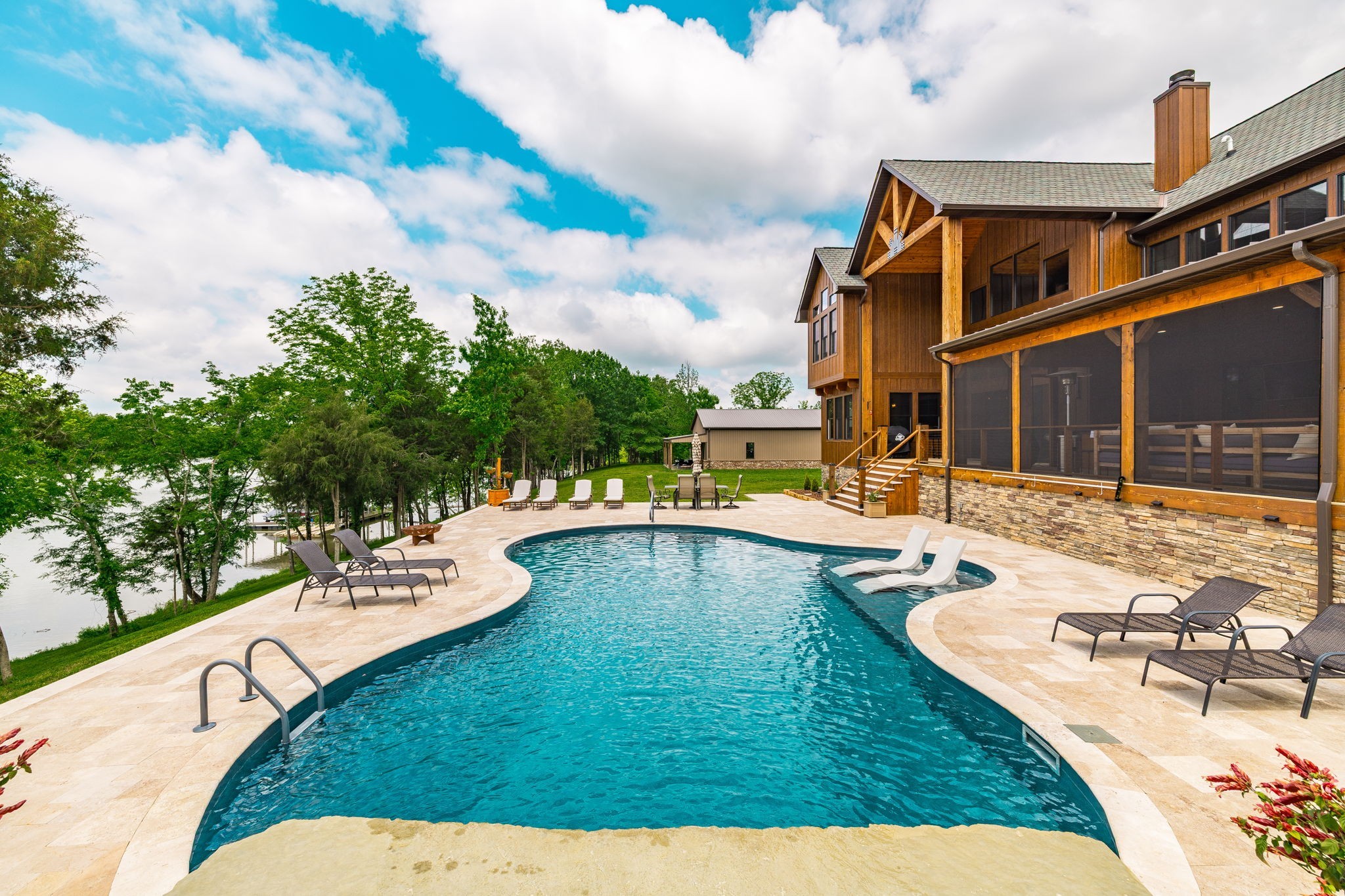 324 Lakeview Road Gallatin, TN 37066 - Photo 20 of 92 a view of a house with swimming pool and sitting area