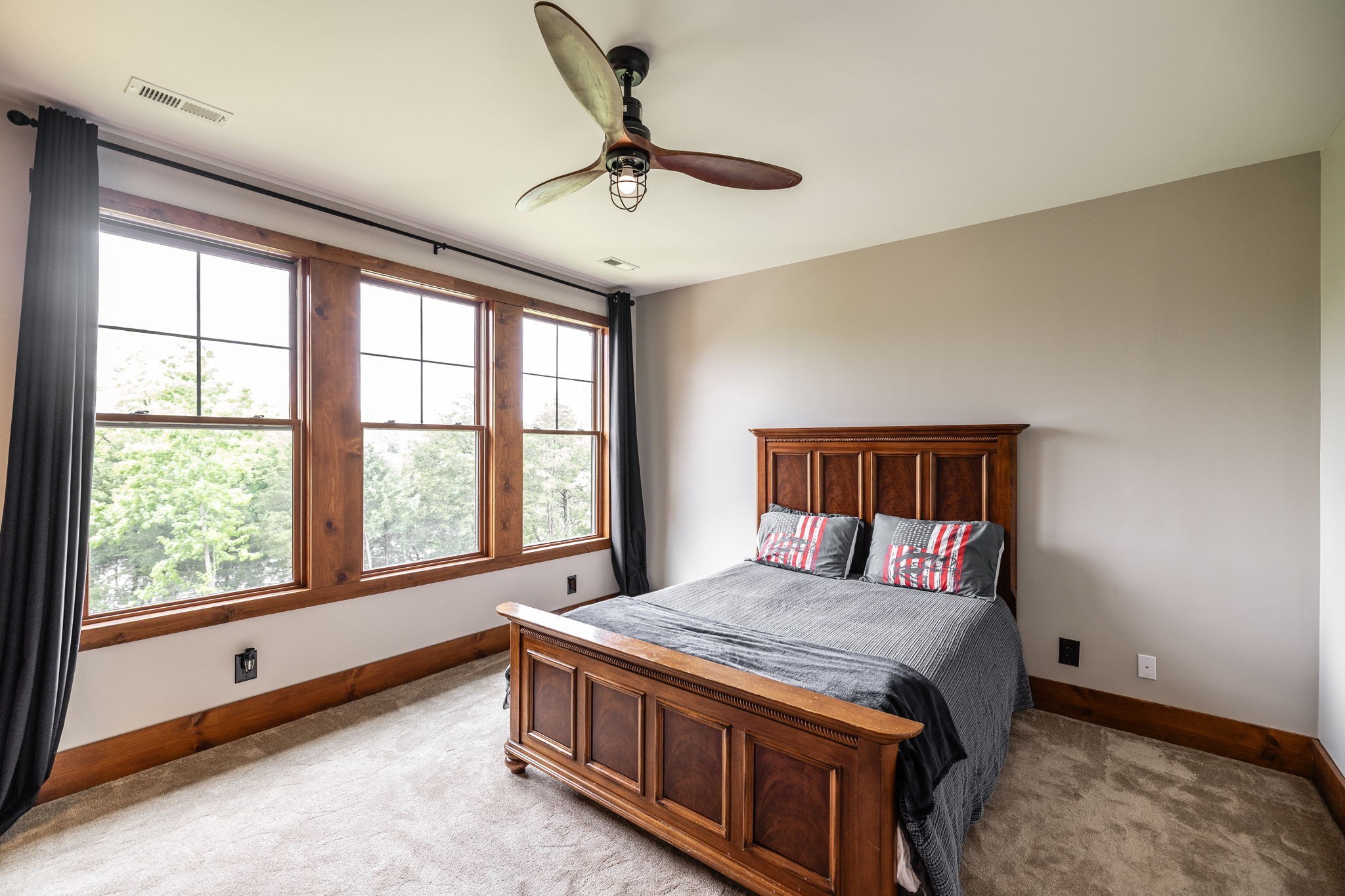 324 Lakeview Road Gallatin, TN 37066 - Photo 63 of 92 a bedroom with a large bed and a large window