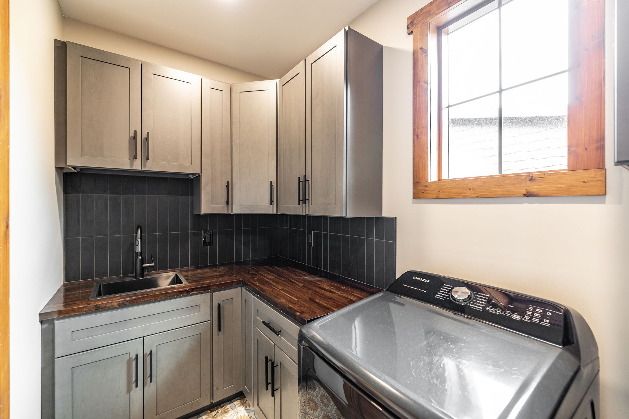 324 Lakeview Road Gallatin, TN 37066 - Photo 78 of 92 a kitchen with a sink a cabinets and window