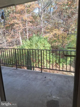 a view of outdoor space with a lake view